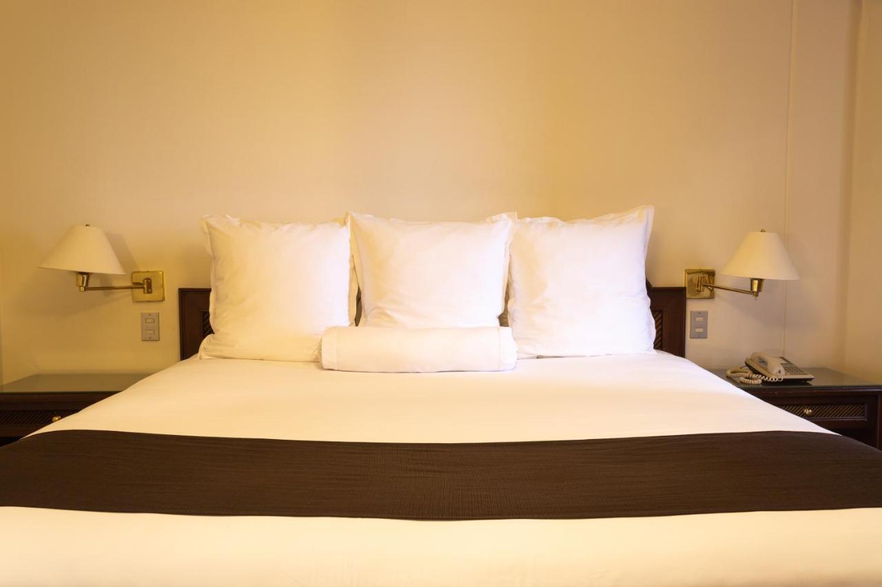 J&A Classic Hotel ليما المظهر الخارجي الصورة A bed